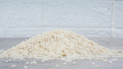 White rice natural on cement background. selective focus