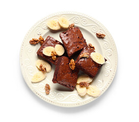 Plate with pieces of tasty chocolate brownie isolated on white background