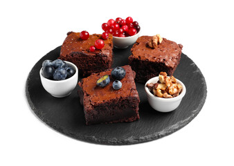 Board with pieces of tasty chocolate brownie isolated on white background