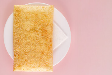 Isolated Fried Pastry on Plate, Brazilian Street Food Pastel, Top View, Copy Space