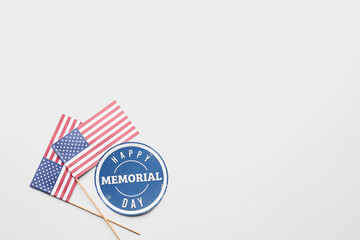 Greeting card with text HAPPY MEMORIAL DAY and USA flags on white background