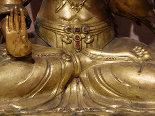 Fototapeta na wymiar Partial view of an antique Asian figurine