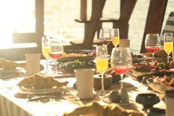 Dining table located on a cruise ship Tourist boats, seafood, drinks