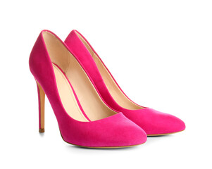 Pair of pink high heeled shoes on white background