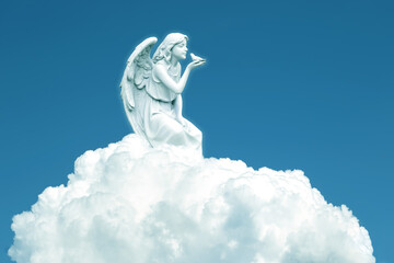 Beautiful angel in heaven on cloud with dove