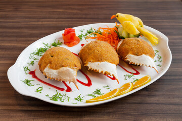 Stuffed Crab on a wooden table