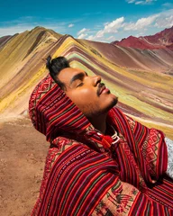 Wall murals Vinicunca peruvian at the rainbow montain vinicunca peru with poncho