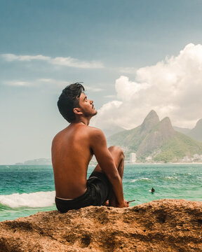 surfist on the beach at ipanema rio de janeiro