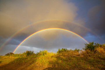 double rainbow over the field in Hawaii