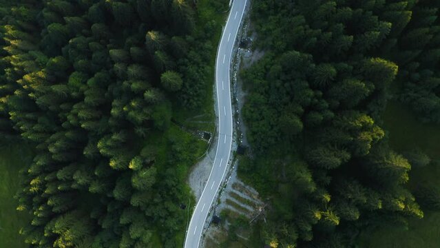 Aerial view following the Riedbergpass road in Allgau, Bavaria, Germany - top down, drone shot