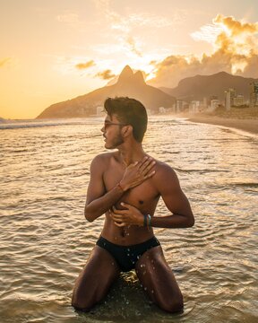 man on the beach in ipanema brazil
