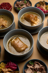 Traditional khash soup with snacks