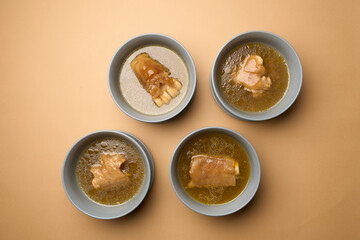 Traditional khash soup with snacks