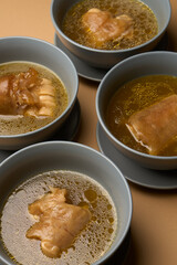 Traditional khash soup with snacks