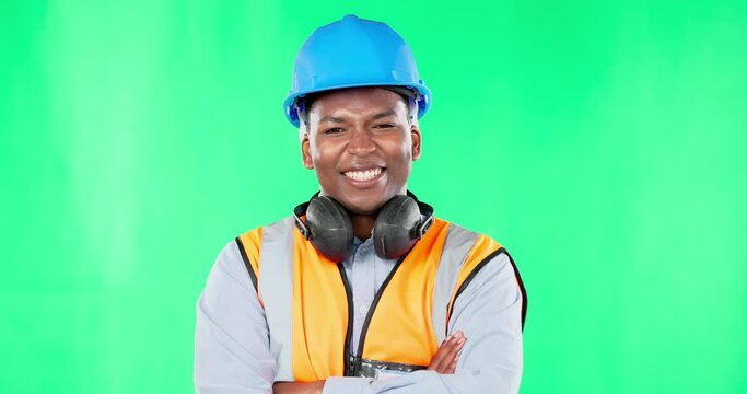 Portrait, arms crossed and a black man construction worker on a green screen background in studio. Building, industry and confidence with a male engineer on chromakey mockup for modern architecture