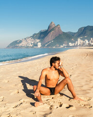 man in ipanema sunbathing