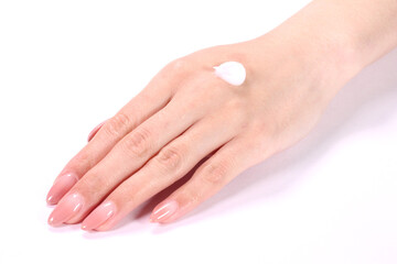 ハンドクリームをつけた女性の手