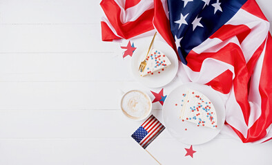 Obraz premium Sweet cake with usa flag colored sprinkles and stars , flag background