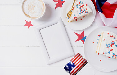 Fototapeta premium Sweet cake with usa flag colored sprinkles and stars and blank frame for mockup