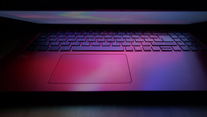 laptop computer keyboard illuminated with lights effects