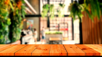 brown wooden board over blurred coffee shop