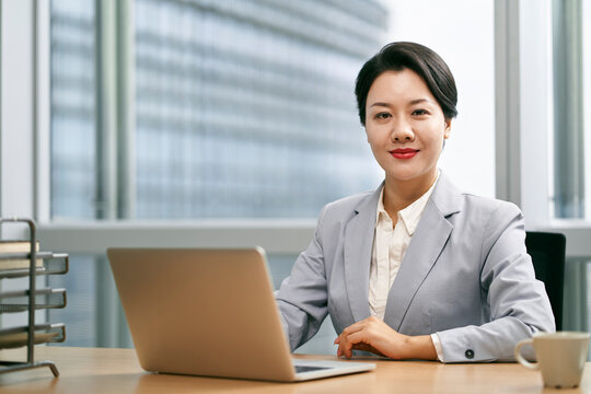 young asian business woman working in modern office