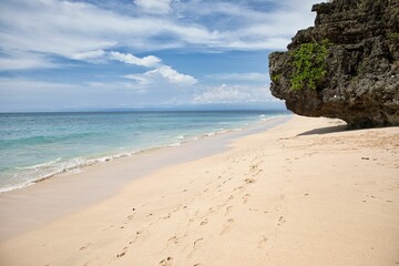 Dreamland beach in Uluwatu, Bali, Indonesia, with its majestic cliffs on the beach.