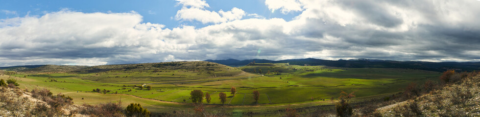 Majestic Green Field and Dramatic Clouds in Sierra Norte de Guadalajara