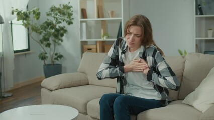 Woman has Got the Symptoms of Heart Attack. Breathing Problems, Chest Pain. Pretty Woman has Difficulty Breathing, Female Hand Touches Chest. Heart Attack, Thoracic Osteochondrosis, Panic Attack