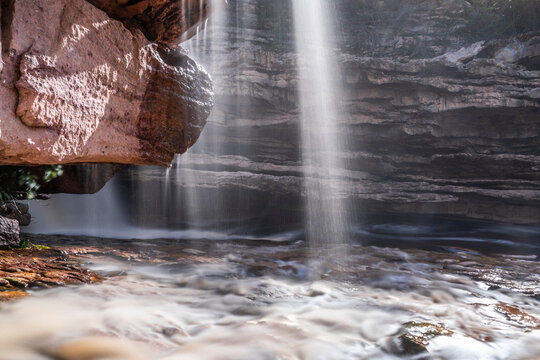 Waterfall from underneath in long exposure