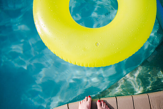 Yellow Inner Tube In Pool