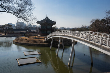 Gyeongbokgung Palace and Hyangwonjeong Pavilion with Chwihyang bridge during winter morning at Jongno-gu , Seoul South Korea : 8 February 2023 - obrazy, fototapety, plakaty
