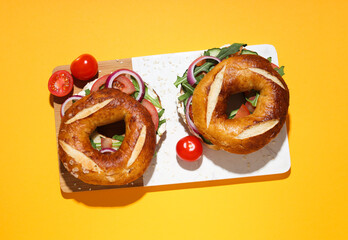 Concept of delicious food - tasty bagel sandwich, top view