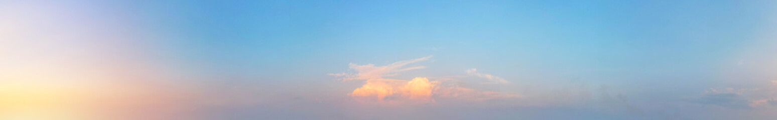 The panoramic view of the orange cloud with sunset light blue sky was a moment of pure beauty and grace, Sky background.