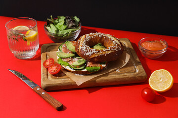 Concept of delicious food - tasty bagel sandwich