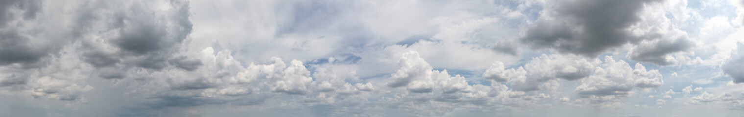 Obraz premium The deep rich tones of the gray clouds against the bright blue sky provided a mesmerizing panorama, Sky background.