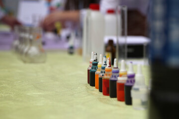 flasks and jars with chemicals, test tubes with paint, work with chemicals, science, chemistry, biology

