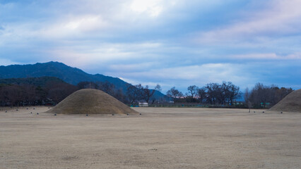 Beautiful view and nature around Ancient Tombs in Inwang-dong during winter evening at Gyeongju , South Korea : 10 February 2023