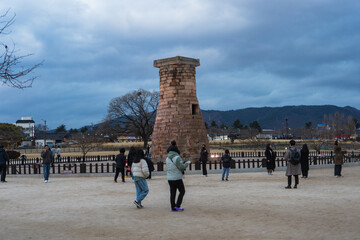 Cheomseongdae ancient astronomical observatory during winter evening at Gyeongju , South Korea : 10 February 2023