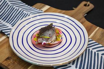 dish on a plate fish herring - obrazy, fototapety, plakaty
