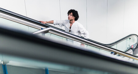 stock photo of latin businessman riding subway to work
