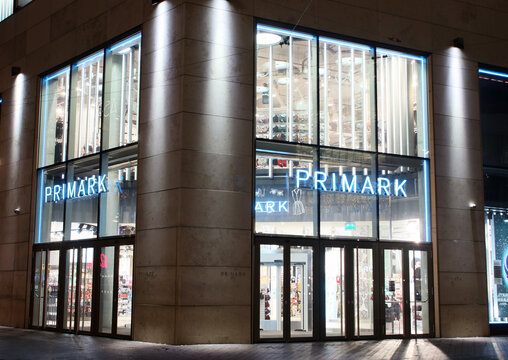 Illuminated entrance of the Primark clothing store on the Kalvermarkt corner of Spui in The Hague