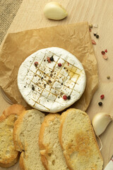 Camembert cheese and garlic sauce with spices