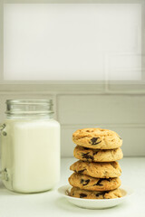Cookies with milk closeup with space for text, side view