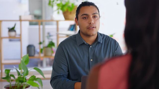 Creative businessman, interview and meeting in recruitment process for company startup at office. Man employer talking to woman intern in hiring, recruiting or explaining business goals or strategy