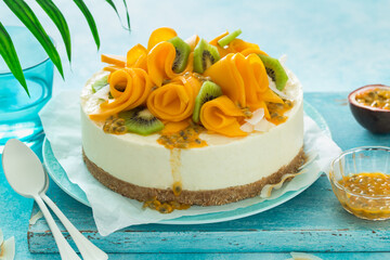 no baked coconut and mango cheesecake with fresh tropical fruits