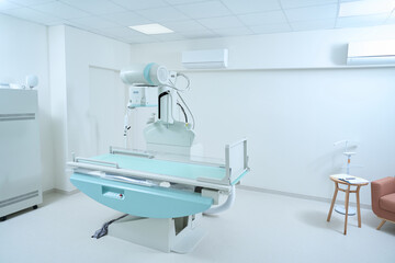 X-ray room with modern X-ray machine in hospital
