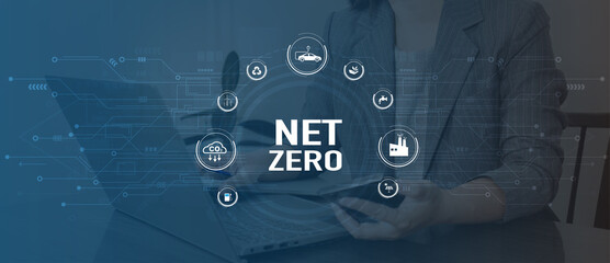 Net Zero Eco business concept. Women use a computer to analyze Net Zero, surrounded by Net Zero...