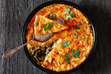 Cheesy Loaded Grits casserole with ground beef