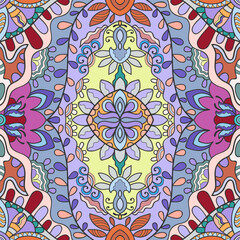 Hand drawn seamless graphic pattern, colorful artistic background with floral and geometric elements. Doodle ethnic mandala ornament for textile fabric, paper print. Surface texture 